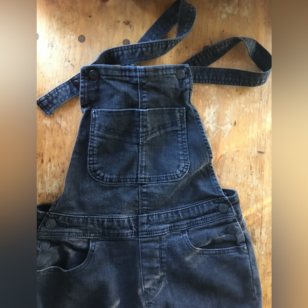 Black Levi, stretchy straight leg overalls. Slim bib.